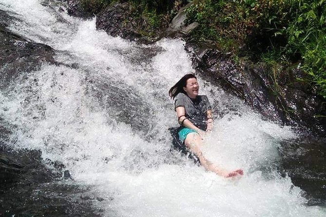 All inclusive Bali Sekumpul Waterfalls Trekking Tour - Swimming, sliding, and jumping beneath the falls