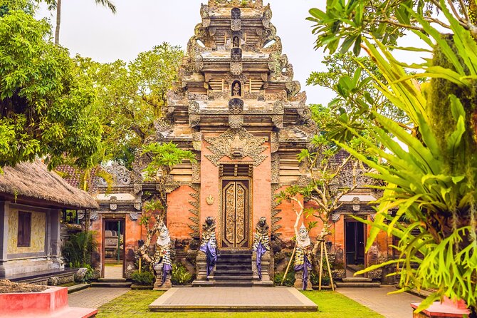 Bali Cultural Experience - Reading the carvings at Ubud Palace