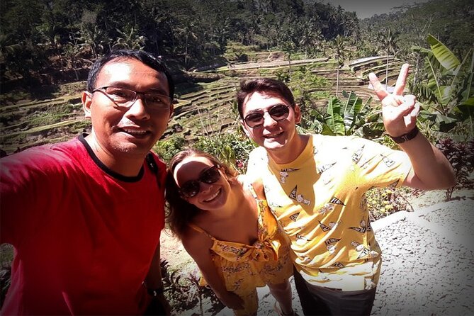 Bali Day Trip: Ubud Temples & Hidden Waterfalls - Tibumana Waterfall begins with a short jungle walk