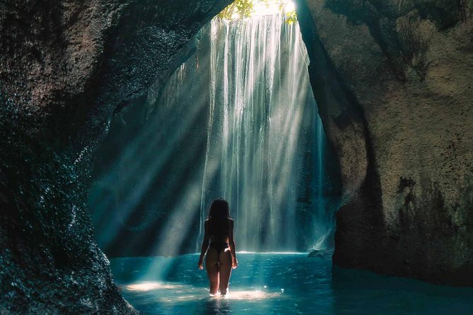 Bali Instagram Tour : Heaven Gate Tour - Tirta Gangga - Tukad Cepung Waterfalls - Tukad Cepung Waterfall inside the cliffs