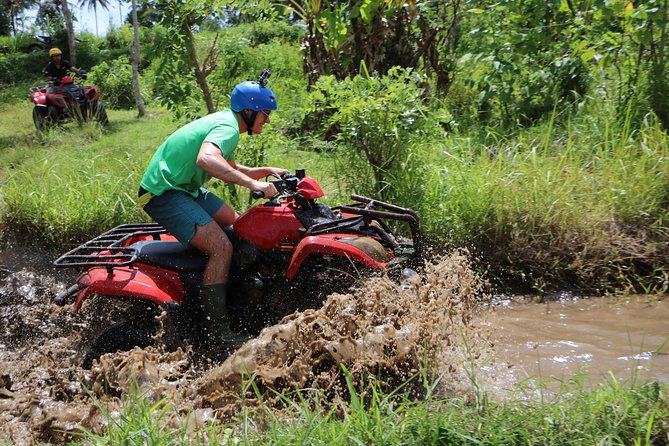 Bali Quad Adventure with Waterfall Tour - Kanto Lampo Waterfall and its broad rock terraces