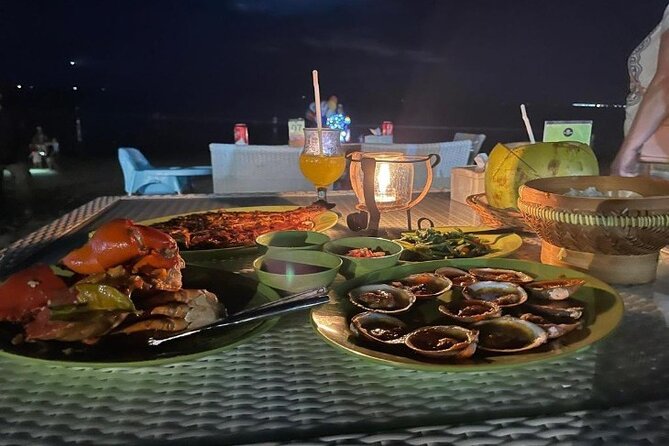 Bali Romantic Seafood Dinner under sunset jimbaran Beach - A romantic setting with a busy edge