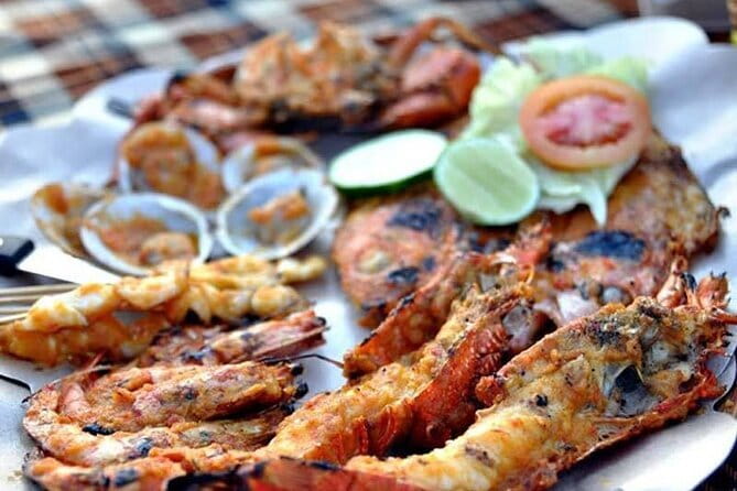Romantic Seafood Dinner at Jimbaran Beach Bali include Sunset - Starting at Ganesha Cafebay