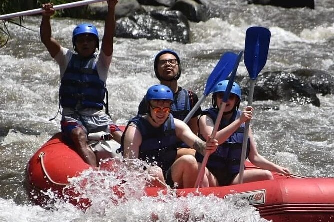 The Best Ayung River Rafting Adventure in Ubud - Getting fitted with a helmet, life jacket, and paddle